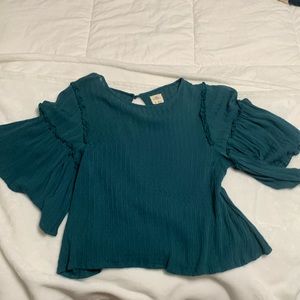 teal blouse